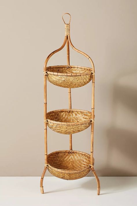 Tiered Basket Stand, Anthropologie Store, Tiered Fruit Basket, Neat Method, Basket Stand, Cane Baskets, Organizing Products, Bamboo Structure, Display Basket