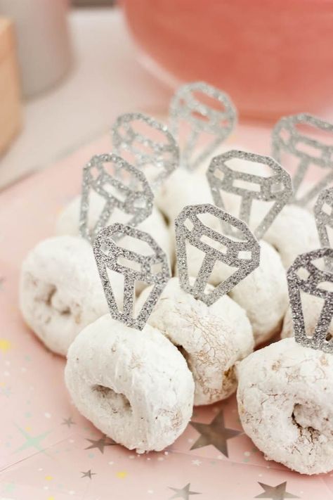 Cute donut rings! Beautiful Bridal Shower Decorations for the Modern Bride! Decorate with the Iridescent Martha Stewart Celebration Line, and personalize your party with the Cricut Explore 2! You're bride will be thrilled with the subtle glitter and glam in these pink and silver decorations! #cricutexplore #bridalshower #modernbride #woodaccents Cricut Projects For Bridal Showers, Simple Modern Bridal Shower Decor, Celebrating The Future Mr And Mrs, Bridal Shower Ideas Donut, Pink And Silver Bridal Shower Ideas, Cute Bridal Shower Decorations, Pink Glam Bridal Shower, Wedding Stuff Made With Cricut, Yellow Wedding Shower Ideas