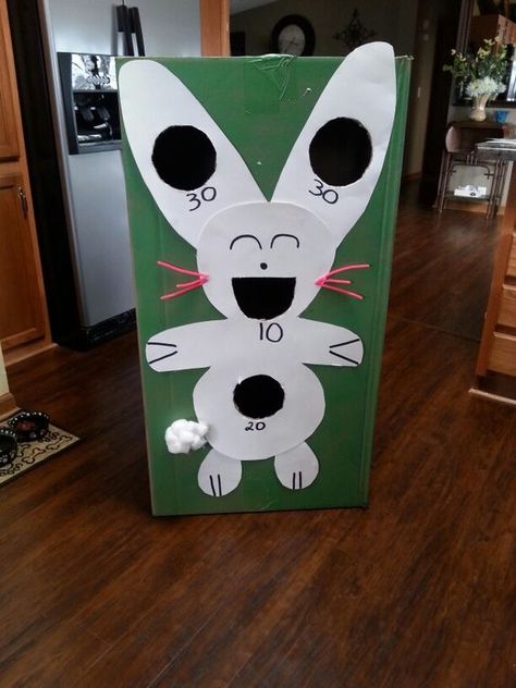 DIY Easter game: Easter bunny beanbag toss game Diy Easter Games For Kids, Party Games For Toddlers, Toddler Bean Bag, Easter Bingo, Toddler Party Games, Easter Puzzles, Easter Games For Kids, Easter Party Games, Easter Activities For Kids