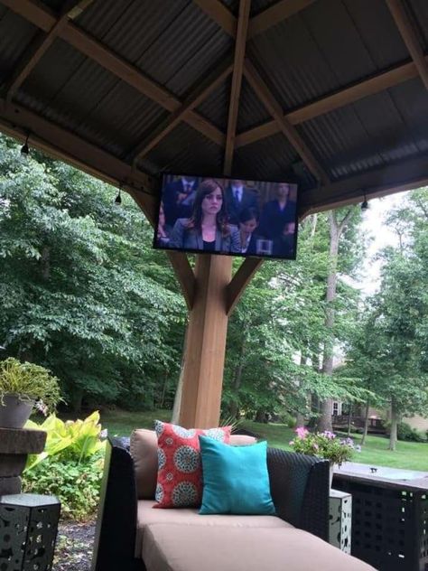 Check Out These 11 Outdoor TV Setups 🌴 📺 ☀️ - Yardistry Structures - Gazebos, Pavilions and Pergolas Screen Porch Tv Ideas, Pavillion Backyard With Tv, Outdoor Porch Tv Ideas, Tv Under Gazebo, Outdoor Area With Tv, Screen Porch With Tv, Tv In Gazebo Outdoor Living, Tv On Porch Ideas, Tv Wall Design Outdoor