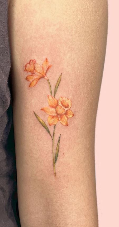 100 Meaningful Daffodil Tattoo Designs - Tattoo Me Now Narcissus Flower Tattoo, Narcissus Tattoo, Flower Tattoo Meaning, Daffodil Flower Tattoos, Narcissus Flower Tattoos, Small Lotus Flower Tattoo, Daffodil Tattoo, Flower Tattoo Meanings, Wildflower Tattoo