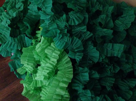 Vines made from roll of crepe paper with machine stitch up the middle. Looks like seaweed too. Paper Seaweed, After Prom, Paper Plants, Vbs Crafts, Pottery Shop, Dinosaur Party, Crepe Paper, Shop Display, Paper Paper