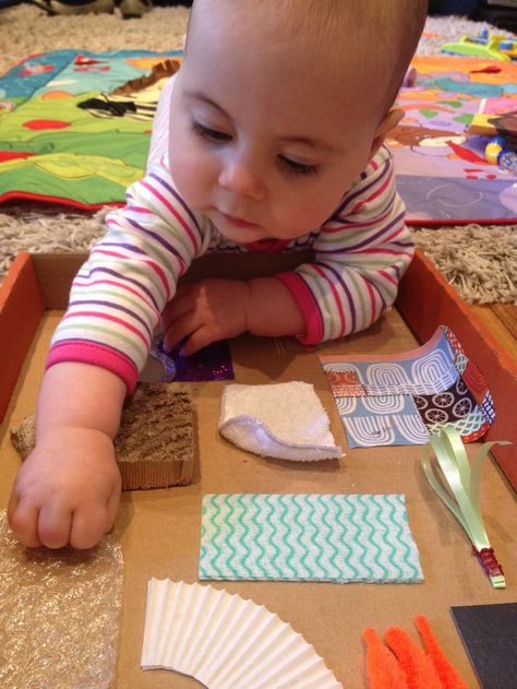 Baby playing on a homemade sensory board. DIY it is so simple and babies find it fun and educational. Good for tummy time too. Baby Sensory Board, Diy Sensory Board, Diy Sensory, Baby Sensory Play, Sensory Board, Sensory Boards, Diy Bebe, Cool Baby, Montessori Baby