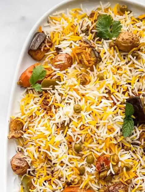 Veg Dum Biryani #biryani #rice #indianrecipe #eggplant #carrot #bean #pea #dinner #dinnerrecipe | Feast with Safiya Pea Dinner, Veg Dum Biryani Recipe, Veg Biryani Recipe, Dum Biryani Recipe, Biryani Recipes, Cilantro Chutney, Biryani Rice, Layered Potato, Veg Biryani