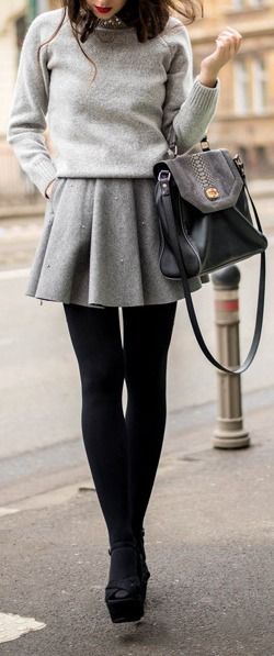 I really like when you can put two of the same color palette on top of each other. I also like the contrast of the super casual top with the more girly skirt. 100 Winter Outfits, Grey Purse, Walking Down The Street, Trench Coat Outfit, Grey Skirt, Trendy Skirts, Outfit Trends, Mode Vintage, Black Tights