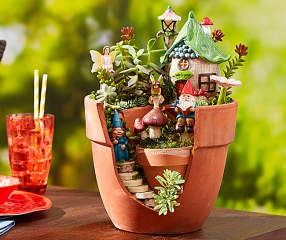 Tight spaces are no match for these fairies! They love living among flowers or plants as they build their nature-inspired homes and tend to your green thumb creations. Garden Diy Decoration Ideas, Gardener Aesthetic, Garden Aesthetics, Fairy Garden Pots, Fairy Garden Gnomes, Gardening Aesthetic, Teacup Gardens, Beautiful Birdhouses, Fairy Garden Designs