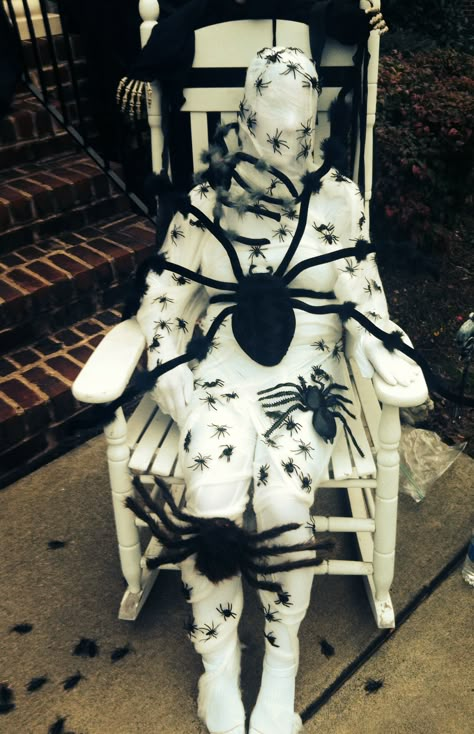 Taken over by spiders!  White morph suit, spider webbing and lots of spiders!  Was a hit! Spider Theme Halloween Decorations Outside, Big Impact Halloween Decor, Halloween Spider Display, Spider Themed Halloween Decor, Spider Room Haunted House, Halloween Courtyard Decorations, Spider House Decoration, Spider Themed Halloween Decor Outside, Scary Spider Costume