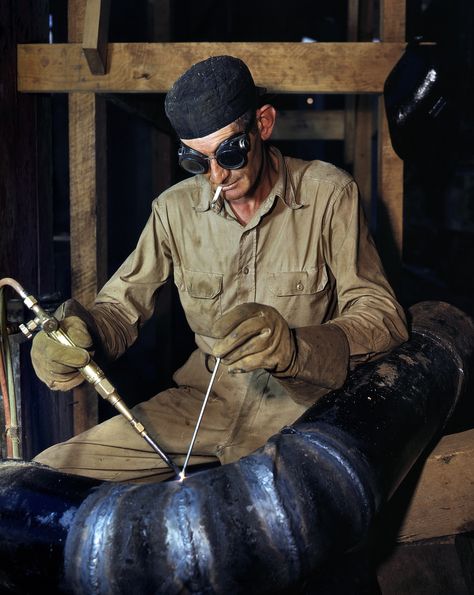 TVA  June 1942. Gas-welding a joint in a line of spiral pipe at the Tennessee Valley Authority's new Douglas Dam on the French Broad River. 4x5 Kodachrome transparency by Alfred Palmer, Office of War Information. | Click image for Comments. Boilermaker Welder, Male Costumes, Tennessee Valley Authority, Gas Welding, Pipe Welding, Arc Welding, Working Class, High Resolution Photos, People Photography