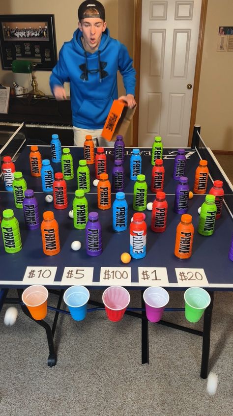 Ping Pong Roll Game, Competition Prizes Ideas, Rolling Can Money Game, Game Challenges Ideas, Ping Pong Cup Game, Ping Pong Games For Kids, Money Party Games, Family Money Games, Family Competition Games