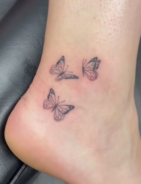 Cute tattoos, ankle tattoos, butterflies tattoo ideas, tattoo ideas, tattoo inspiration, ankle tattoo ideas, pretty tattoos 3 Butterfly Ankle Tattoo, Mum Butterfly Tattoo, Butterfly 333 Tattoo, Butterfly Ankle Tattoos For Women, Three Butterfly Tattoo, Ankle Butterfly Tattoo, Butterfly Tattoo On Ankle, Butterfly Tattoo Ankle, Tattoo Ideas Placement