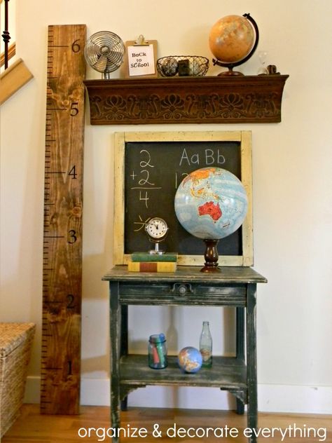 I thought I would share my back-to-school decor before I replaced it with Fall decor. I know it’s a little late but I’m running a little behind these days. I didn’t decorate much for back-to-school but my entry did get a little makeover. I gathered things from around the house that related to school. The … Back To School Window Display, Vintage School Decor, Vintage Classroom Decor, Back To School Displays, Diy Back To School, Old School House, Entry Decor, School Displays, Classroom Decor Themes