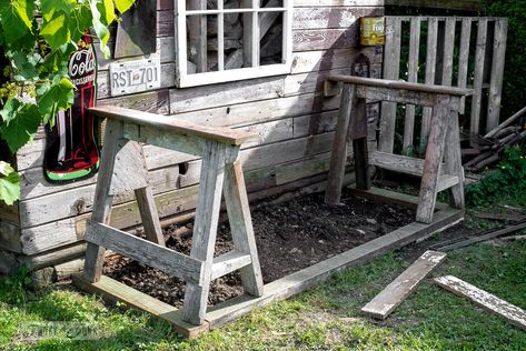 Sawhorses levelled to work as legs for a potting bench build - Rustic shed update 2 | funkyjunkinteriors.net Garden Work Bench Potting Station, Build Potting Bench, Rustic Potting Benches, Primitive Gardens, Garden Work Bench, Potting Station, Build Outdoor Furniture, Rustic Shed, Bar Outdoor