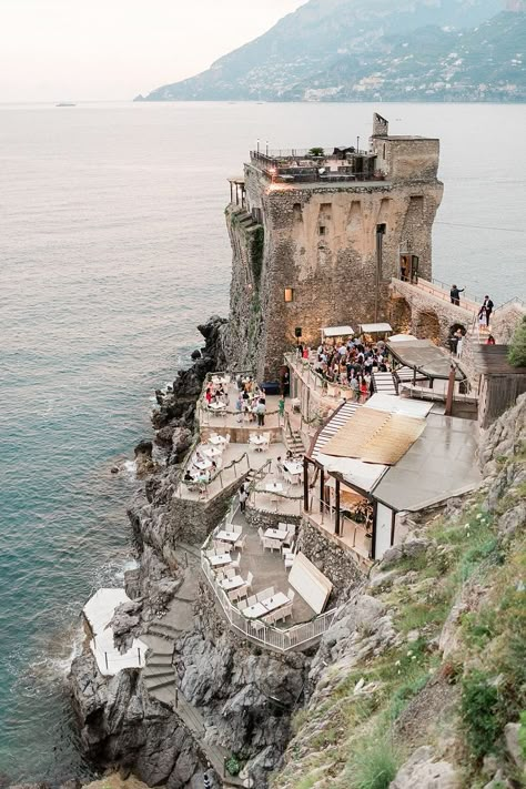 This Bride Married Her “Work Crush” at a Seaside Wedding in Positano Italy Wedding Reception Amalfi Coast, Amalfi Coast Wedding Venues, European Beach Wedding, Sorrento Italy Wedding, Almafi Coast Italy Wedding, Italy Beach Wedding, Coastal European Wedding, Amalfi Coast Wedding Theme, Wedding In Portugal