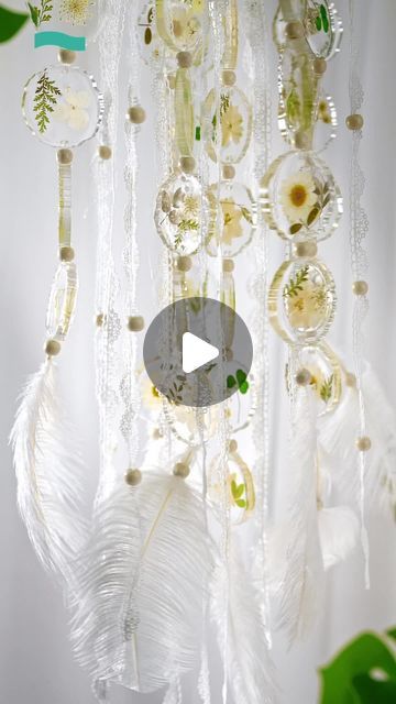 Resiners on Instagram: "We’re excited to share our latest project: beautiful Resin Wind Chimes adorned with delicate pressed flowers. Perfect for beginners and seasoned crafters alike, these wind chimes are not just a visual delight but also bring positive energy and protection to your space.⁠

#resinersmachine #resiners #DualHeadResinMixer #Resinermixer #ResinMixer #DIYWindChimes #ResinCrafts #ResinArt #WindChimes #WitchcraftWindChimes #SpiritualMeaning #HomemadeChimes #PressedFlowerResin #ResinForBeginners #CraftingSerenity" Resin Windchimes, Resin Art Car Hanging, Resin Dream Catcher, Resin Rear View Mirror Decor, Resin Moon Suncatcher, Diy Wind Chimes, Pressed Flowers, Resin Crafts, Positive Energy