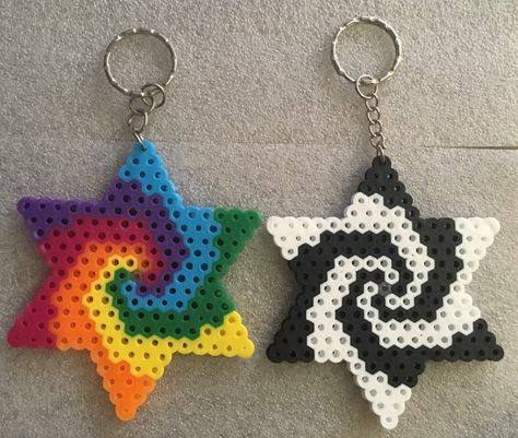 These are 6-pointed stars. I've shown 2 varieties; rainbow spiral and black & white spiral. You are welcome to include a note or message to further customize this design, maybe a pattern between 2 colors for example :) Buy this item with another small item from my shop to receive discounted shipping cost Star Perler, Perler Keychain, Spiral Star, Easy Perler Bead Patterns, Perler Creations, Melty Bead Patterns, Pearl Beads Pattern, Easy Perler Beads Ideas, Perler Bead Templates