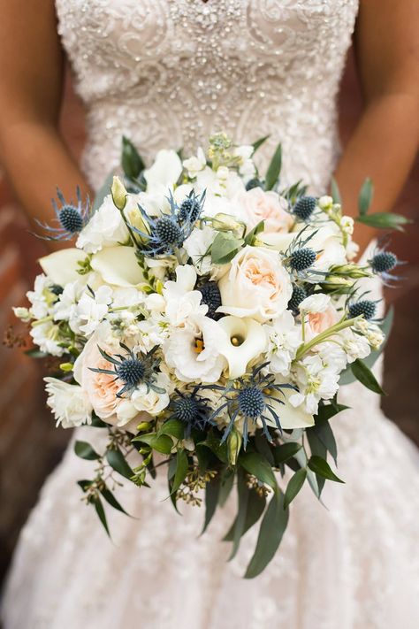 Round wedding bouquet with blue thistle and calla lilies #flowers #rose #lilies #bouquet #floral Round Wedding Bouquets, Wedding Bouquets Blue, Filipino Wedding Traditions, Thistle Bouquet, Thistle Wedding, Filipino Wedding, Blue Wedding Bouquet, Beach Wedding Flowers, Floral Wedding Decorations