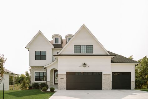 James May Homes White House With Limestone, Limestone And Siding Exterior, White Limestone House Exterior, White House With Stone Accents, Stucco And Stone Exterior, Oakstone Homes, Farmhouse Color Scheme, Limestone House, Siding Ideas