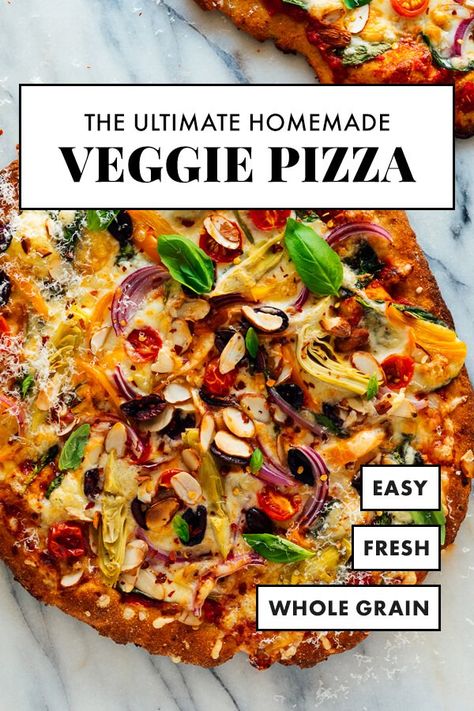 Make the BEST veggie pizza at home! This mouthwatering pizza recipe features fresh cherry tomatoes, bell peppers, artichoke, spinach and more. This recipe is designed to be easy and flexible, so it's perfect for a laidback pizza night at home! #pizza #veggiepizza #vegetarian #cookieandkate Best Veggie Pizza, Pizza Night At Home, Vegetarian Pizza Recipe, Veggie Pizza Recipe, Cookie And Kate, Pizza At Home, Whole Wheat Pizza, Pizza Sauce Recipe, Fresh Cherry