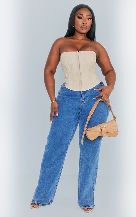 Get ready to look all kinds of chic in this plus cream washed faux leather hook and eye structured corset. Brought to you in a cream hue washed faux leather material with a hook and eye design and a flattering structured corset fit, how can you not fall in love? Style this plus corset with jeans, heels and a mini bag for a look that is sure to nail the 'jeans and a nice top' dress code. Length approx 33cm/13inch (Based on a sample size UK 16) Model wears size UK 16/ EU 44/ AUS 16/ US 12Model Height - 5ft 6inchp]:!mb-0inch>Category: TopsProduct type: CorsetColour: CreamDesign: PlainNeckline: BandeauSleeves: SleevelessOccasion: Evening Bustier Top Plus Size, Corset Top Plus Size, Corset Tops Plus Size, Styling Corset Top Plus Size, Corset With Jeans, Leather Corset Plus Size, Corset Outfit, Mom Jeans Outfit, Going Out Tops