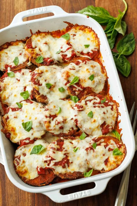 Eggplant Parmesan: Crispy breaded eggplant, layered with marinara sauce and mozzarella cheese, baked to perfection into a saucy and cheesy casserole. Eggplant Parmesan With Meat, Eggplant Parm Casserole, Eggplant Parmesan Casserole Recipes, Baked Eggplant With Tomatoes And Cheese, Eggplant Parmesan With Fresh Mozzarella, Spicy Eggplant, Crispy Eggplant, Eggplant Parmesan Baked, Pasta E Fagioli Soup