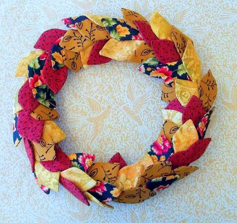 Make a Pretty Wreath from Fabric Leaves - Quilting Digest Folded Fabric Wreath, Fabric Leaf Wreath, Fabric Wreath Tutorial, Quilt Sewing Room, Apple Wreath, Fabric Wreath, Spring Quilts, Pretty Wreath, Fall Patterns