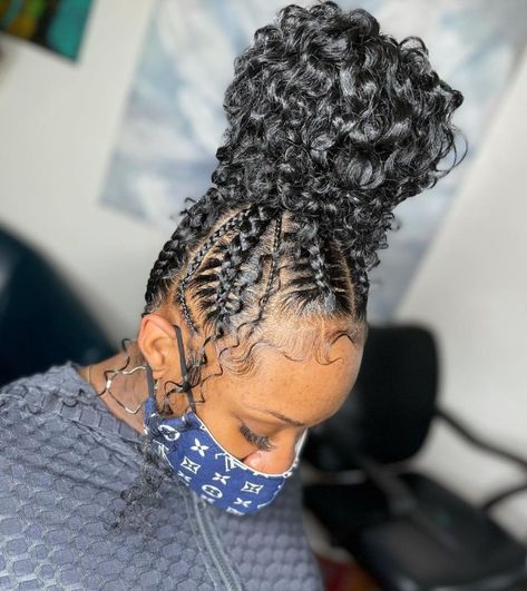 Cornrows with a Big Curly Bun Bohemian Feed In Bun, Braided Curly Bun For Black Women, Feed In Braids With Curly Hair Bun, Braids Into Curly Ponytail, Boho Feed In Braids Ponytail, Bohemian Bun Black Women, Braided Back Bun Black Women, Braids For Black Women Updo, Braids In A Bun Black Women