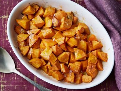 Honey Roasted Sweet Potatoes Recipe | Ellie Krieger | Food Network Honey Roasted Sweet Potatoes, Sweet Potato Recipes Roasted, Ellie Krieger, Sweet Potato Recipes Healthy, Sweet Potatoes Recipe, Best Thanksgiving Side Dishes, Stuffed Sweet Potato Healthy, Healthy Thanksgiving, Thanksgiving Recipes Side Dishes