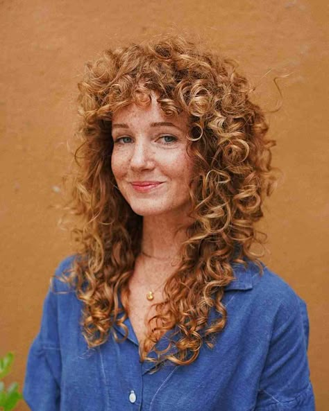 25 Best Ways to Get Curly Hair with Bangs in 2022 Curly Hair Without Layers, Short Layers On Curly Hair, Kitty Cut Curly Hair, Naturally Curly Hair Bangs, Long Curly Hair With Side Bangs, Curly Hair From The Back, Balayage Hair Auburn, Long Curly Hair With Fringe, Long Shag Curly Hair No Bangs