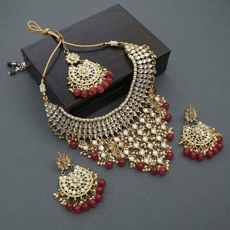 Gold Plated Bridal Indian Wedding Jewelry$84.99   FREE SHIPPINGUS MART NEW YORKwww.usmartny.comPurchase Link: https://www.usmartny.com/collections/jewelry-sets/products/gold-plated-choker-necklace-earrings-set-wedding-bridal-indian-fashion-jewelry Elegant Indian Wedding, Studded Choker, Maang Tikka Set, Indian Fashion Jewellery, Lehenga Red, Bridal Lehenga Red, Maang Tikka, Indian Wedding Jewelry, Bridal Lehenga