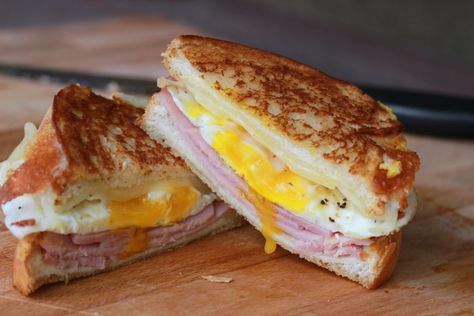 This Ham and Egg Grilled Cheese Sandwich is perfect for breakfast or dinner. It is loaded with ham, delicious cheese and a perfectly cooked egg. Egg Grilled Cheese Sandwich, Ham Grilled Cheese, Gourmet Grilled Cheese Sandwich Recipes, Ham And Egg Sandwich, Gourmet Grilled Cheese Sandwich, Grilled Ham And Cheese, Egg Grill, Gourmet Grilling, Egg And Cheese Sandwich