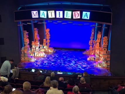 Matilda Set Rental | Music Theatre International Matilda Broadway, Matilda Costumes, Matilda Jr, Matilda Musical, Musical Theatre Posters, Theater Set Design, Musical Decor, Creative Costume Ideas, Matilda The Musical