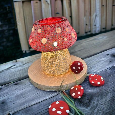 This my favorite warmer from the Spring/Summer 2024 catalog, the Cute as a Button Warmer, is sure to bring a touch of whimsy and wonder to any space in your home. Its unique mushroom design features a handmade mosaic pattern that shines dappled light on nearby surfaces when lit, creating a truly enchanting atmosphere. #mushroomsroom Scent Warmers, Scentsy Party, Scentsy Wax Bars, Scentsy Fragrance, Fall Planters, Dappled Light, Fabric Spray, Cute As A Button, Handmade Mosaic