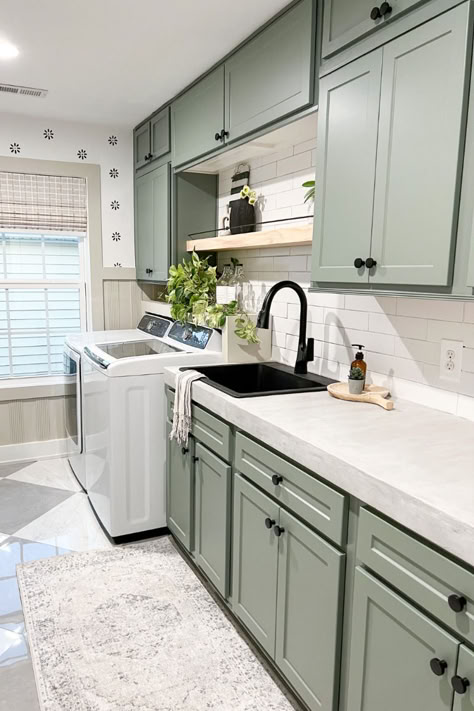 Front + Center door fronts are for more than the kitchen! You can bring fresh style and new functionality to your laundry room too.    Featured here is our Shaker Door front in Sage SuperMatte ✨  #laundryroomdesign #laundryroomideas #homeimprovement #laundryroomrenovation Laundry With Green Cabinets, Sage Green And Black Laundry Room, Sage Green Laundry Room Cabinets, Green Cabinets Laundry Room, Laundry Room Green Cabinets, Green Laundry Room Cabinets, Sage Green Laundry Room, Door Refacing, Green Laundry Room