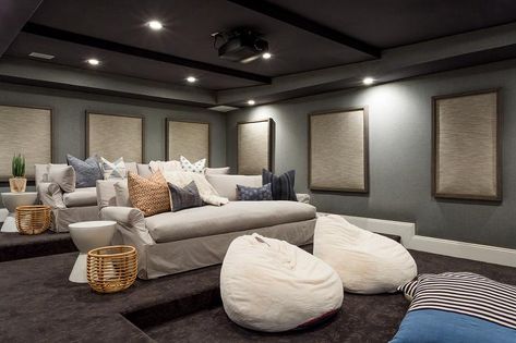 Light gray slipcovered roll arm sofas topped with blue and brown pillows sit on dark gray carpeting in a movie room featuring white bean bags. Movie Room Ideas, Basement Movie Room, Bunk Beds Built In, Home Cinema Room, Built In Bunks, Light Grey Walls, Brown Carpet, Home Theater Rooms, Home Theater Design