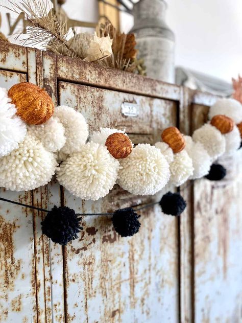 I love this combination for a DIY Halloween Pom Pom garland because it will also transition to fall. I don’t decorate a lot for Halloween now that the kids are away, but I thought it would be fun to add just a touch of DIY Halloween decor this year. I love pom poms! I find... The post DIY Halloween Pom Pom Garland appeared first on Hootshack. Diy Halloween Garland, Fall Decor On A Budget, Garland Tutorial, Fall Decor Diy Crafts, Boho Halloween, Diy Fall Decor, Halloween Garland, Pom Garland, Halloween Tattoo