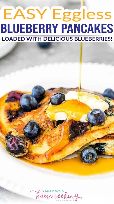 These Eggless Blueberry Pancakes are most definitely not a weekend-only treat! They’re light and fluffy, loaded with delicious blueberries and made from scratch! A guaranteed family favorite. This easy recipe makes eggless pancakes that are light and fluffy and only calls for a few simple ingredients you probably have in your kitchen right now. | @mommyhomecookin #egglessbreakfastrecipes #egglesspancakes #egglessrecipes Eggless Pancakes, Eggless Breakfast, Family Friendly Breakfast, Blueberry Pancakes Recipe, Blueberry Pancake, Pancake Bites, Breakfast Bread Recipes, Eggless Recipes, Blueberry Pancakes