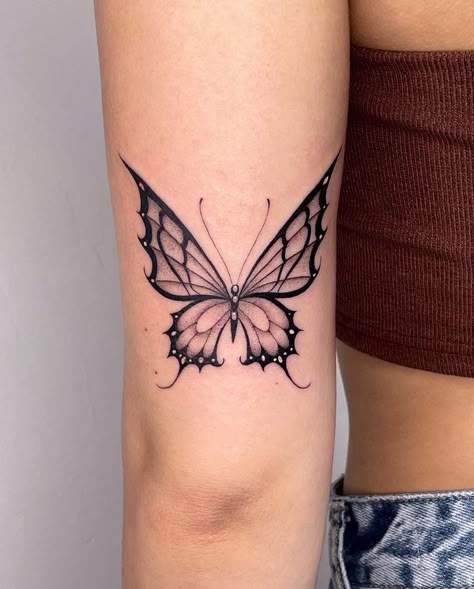 Butterfly Tattoo Styles, Pointy Butterfly Tattoo, Cool Butterfly Tattoos Unique, Back Of Arm Butterfly Tattoo, Butterfly Throat Tattoos Women, Sick Tattoos For Women, Tattoo On Thigh For Women, Grunge Butterfly Tattoo, Fire Butterfly Tattoo