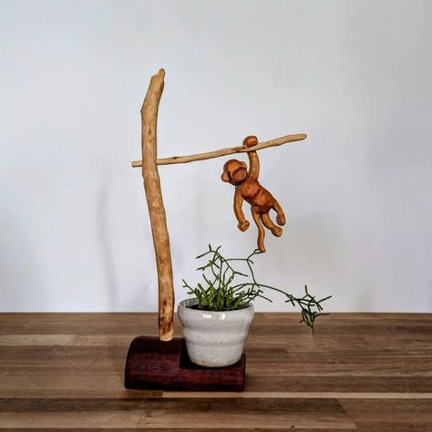 Request number 2 complete! After a few weeks of being sidetracked by other projects and simply avoiding something that was a bit difficult I've finished The Monkey. Not only is he a hanging sculpture his base is also a plant stand for a very little plant. The monkey is made from reclaimed Kauri Pine and the rest is made from various found timber, all found with my favourite danish oil. #woodworkaustralia #woodcarving #woodmonkey #woodcrafts #whittingaustralia #whittling #plantstand #reclai... Monkey Plant, Monkey Wood, Power Carving, Hanging Sculpture, Support Pour Plante, Wood Animal, Reclaimed Timber, Danish Oil, Love Craft