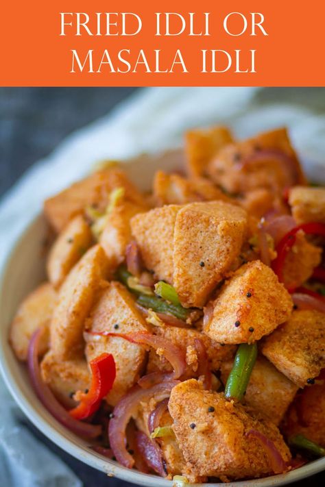 Fried Idli or Masala Idli is a yummy breakfast dish made with leftover Idlis. This is a mildly spiced dish made by sauteing vegetables and idlis in a pan. #friedidli #masalaidli #idlirecipe #friedidlirecipeeasy #friedidlistreetfood #friedidlibreakfast Vegetarian Food List, Masala Idli, Pav Bhaji Masala, Fried Breakfast, Idli Recipe, Savory Rice, Beans Curry, Tastemade Recipes, Vegan Side Dishes