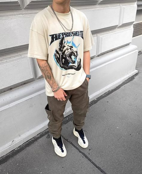 Graphic Tee And Cargo Pants Men, Yeezy Fits Men, Mens Tan Outfit, Men Outfits Graphic Tees, Graphic Tees Outfit Street Style Men, Tan Graphic Tee Outfit, Graphic Tee Fits Men, Yellow Tee Outfit, Yeezy Outfit Men