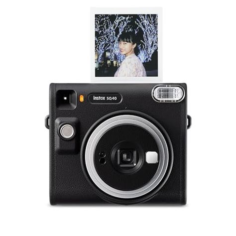 Price: (as of at the time of purchase will apply to the purchase of this product.">Details) Spark unique moments of creativity with the INSTAX SQUARE SQ40™ instant camera – a chic instant camera that looks as good as it shoots. That’s right, it’s got a sophisticated black textured finish that’ll go with any style. And it’s remarkably easy to operate, helping you capture beautiful INSTAX SQUARE instant photos, every time. In fact, when it came to designing the square silhouette, we ... Fujifilm Instax Square, Instax Square, Hat Portrait, Woman Engineer, Camera Recording, Keyboard Typing, Woman Hat, Selfie Mirror, Instant Photos