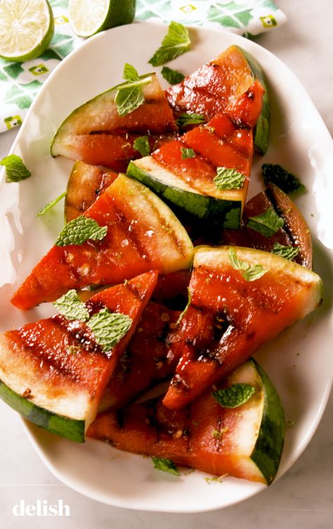 You'll be addicted to Grilled Watermelon this summer. Get the recipe at Delish.com. #recipe #easy #easyrecipes #delish #grilled #watermelon #summer #mint #lime #fruit Grilled Oranges, Watermelon Grill, Bbq Fruit Ideas, Grilled Watermelon Recipes, Yellow Meat Watermelon, Grilled Fruit Dessert, Grilled Fruit Recipes, Grilled Watermelon, Grilling Recipes Sides