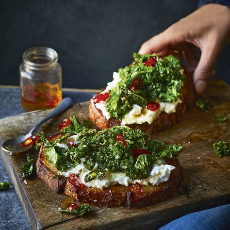 Crispy Kale Toast with Whipped Feta and Honey Recipe | Recipes from Ocado Whipped Feta Toast, Kale Sandwich Recipes, Feta Egg Toast, Kale Toast, Honey Whipped Feta With Olives, Kale Sandwich, Honey Harrisa Carrots With Whipped Feta, Whipped Feta With Honey Crostini, Feta And Honey