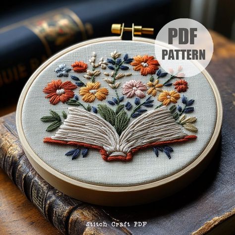 DESCRIPTION Dive into the world of literature and nature with this Book and Floral Hand Embroidery Pattern! Perfect for book lovers and embroidery enthusiasts, this design features an open book with vibrant flowers blooming from its pages. Ideal for creating stunning hoop art, this pattern is suitable for all skill levels and instantly downloadable. Let's stitch and bring this beautiful scene to life! YOUR DOWNLOAD INCLUDES: ~ Printable PDF pattern in 6 sizes: 3,4,5,6,7 and 8 inches, giving you Reading Embroidery Pattern, Open Book Embroidery, School Embroidery Designs, Book Embroidery Design, Book Embroidery Pattern, Embroidery Designs Flowers, Hand Stitching Patterns, Embroidery Storage, Books Embroidery