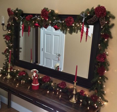 Christmas Lights Around Mirror, Christmas Decor Ideas For Mirror, Mirror Decor Christmas, Christmas Decorations Mirror, How To Decorate A Mirror For Christmas, Mirror Garland Christmas, Christmas Decor Mirror, Mirror Christmas Decor Ideas, Christmas Mirror Decorations Ideas