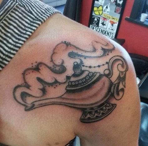 A beautiful genie lamp I came across. I want to get something similar designed on my foot Alladin Lamp Tattoo, Genie Tattoo Ideas, Genie Bottle Tattoo, Aladdin Lamp Tattoo, Magic Lamp Tattoo, Genie Lamp Drawing, Genie Lamp Tattoo, Fairytale Tattoos, Genie Tattoo