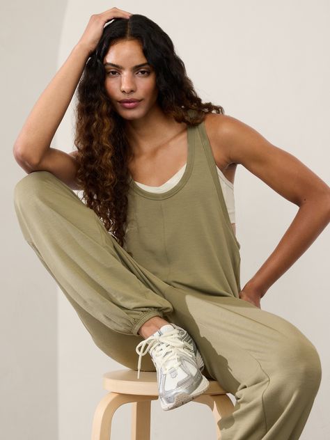 FOR: Yoga or studio practice FEEL: Nirvana is the softest fabric imaginable FAVE: Easy-access hand pockets One piece long romper Scoop neck. Athleta Outfit, Petite Jumpsuit, Fitted Jumpsuit, Bra Dress, Girl Online, Long Romper, Petite Size, Girls Shopping, Jacket Tops