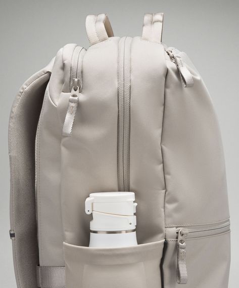 The perfect backpack for your everyday adventures. This roomy, lightweight backpack features two zippered compartments, a padded laptop sleeve, and a water-resistant front pocket.

#lululemon #backpack #travel #hiking #gym https://whispers-in-the-wind.com/back-to-school-bag-essentials-you-didnt-know-you-needed-but-totally-do/?what-i-would-bring-to-a-job-interview Shoulder Bag For College, Backpack With Water Bottle Pocket, Cute Middle School Backpacks, Lulu Backpack Aesthetic, Good School Backpacks, Teen Girl Backpacks, College Backpacks For Women, Backpacks For High School Aesthetic, Backpack With Pockets