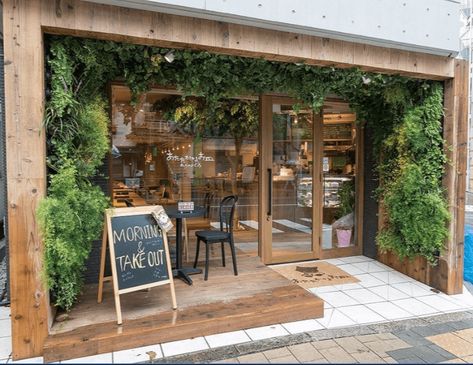 Living plant wall in coffee shop Cafe Exterior, Small Coffee Shop, Coffee Shop Interior Design, Cafe Shop Design, Small Cafe, Coffee Shops Interior, Garden Cafe, Coffee Shop Design, Coffee Shop Decor