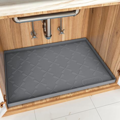 PRICES MAY VARY. 【Double The Thickness】: The SIKADEER sink mat is crafted with 100% food-grade silicone, BPA-free, ensuring durability and safety. The mat edges are raised to 0.75 inch, with a thickness double that of most products on the market, providing a high-capacity waterproof barrier. 【Multi-Functional Protector】: This versatile mat offers excellent protection for your cabinets, floors, or bar tops, preventing scratches, leaks, and dirt. It's perfect for maintaining the pristine condition Expensive Bathrooms, Under Sink Mat, Refrigerator Liners, Bar Tops, Boot Tray, Sink Mats, Silicone Tray, Shelf Liner, Drip Tray